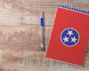 Educational needs of notebook and pen with the Tennessee flag