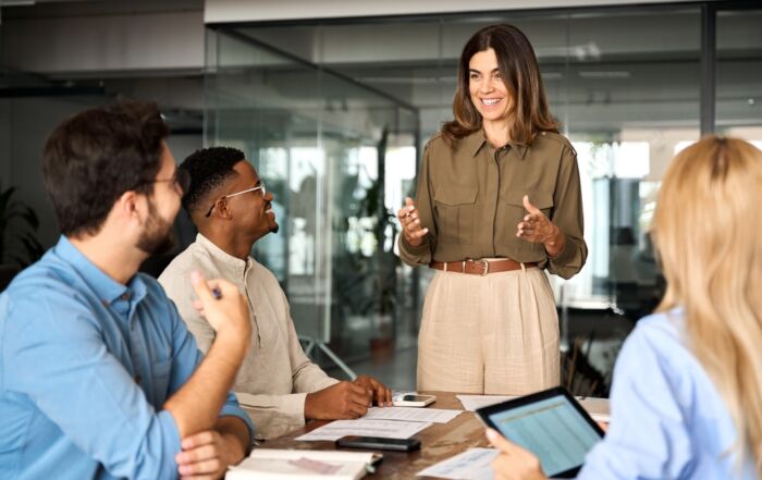 A woman leads a team discussion