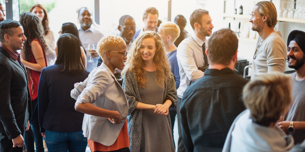 A group of professionals socializing at an event