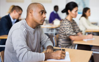 Man receiving high school education.