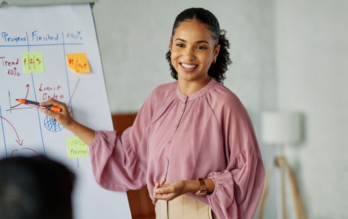 A woman leading training.
